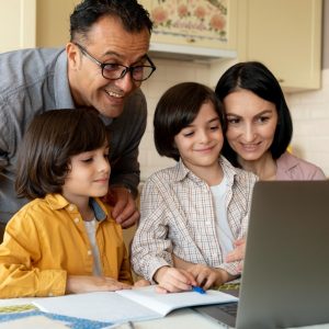 family-looking-together-laptop-home (1)